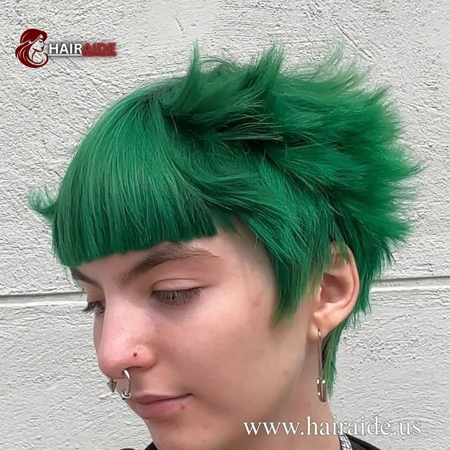 A short shaved wig with bangs in forest green