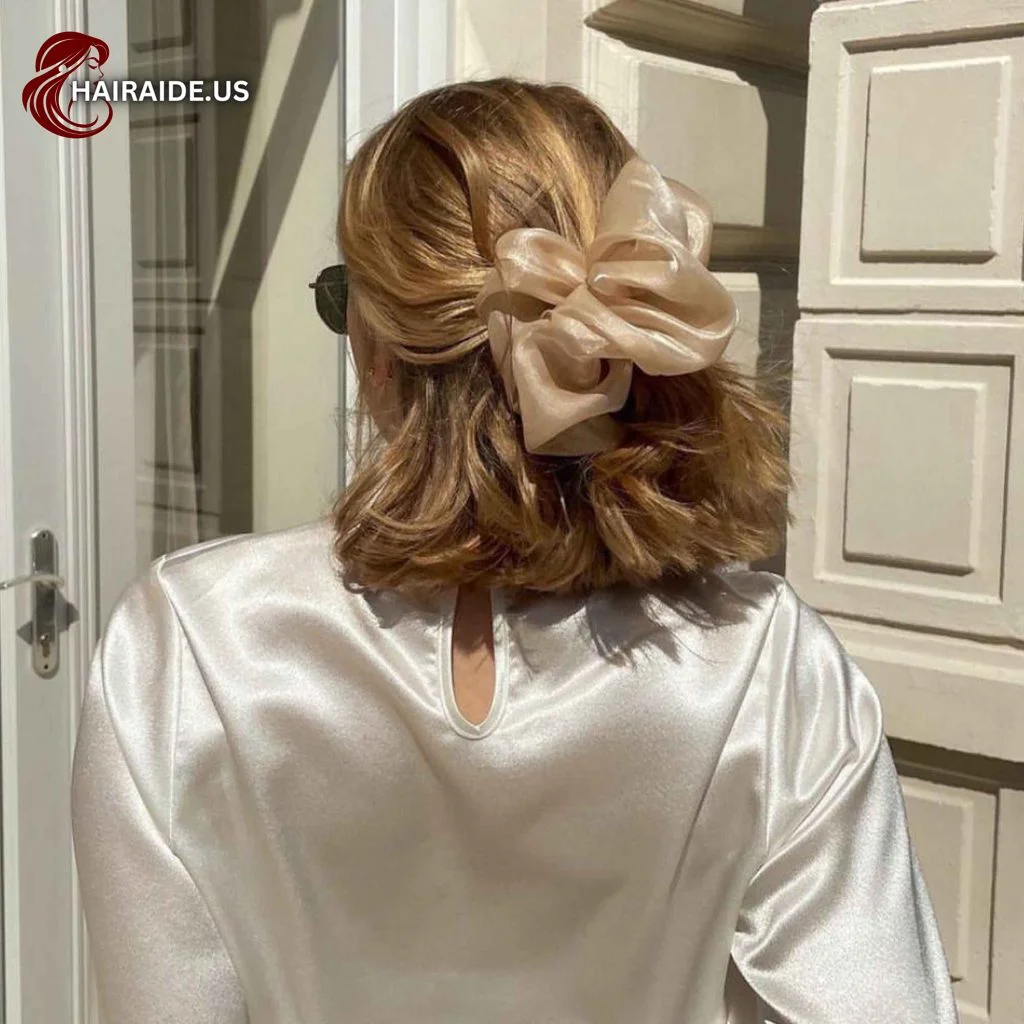 Parisian-Inspired Short Bronde Hair Tied with a Scrunchie